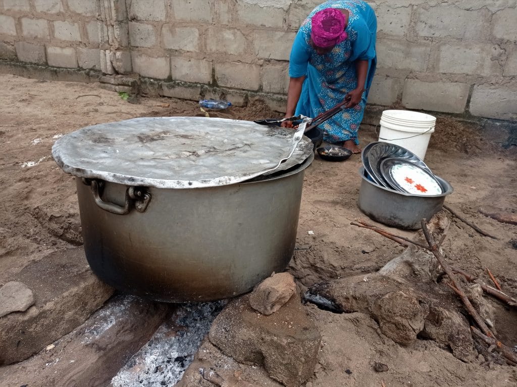 woman cooking for the ceremony